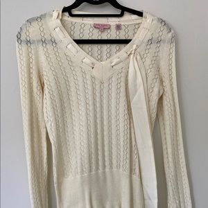 Cream v-neck knit sweater by Ted Baker.